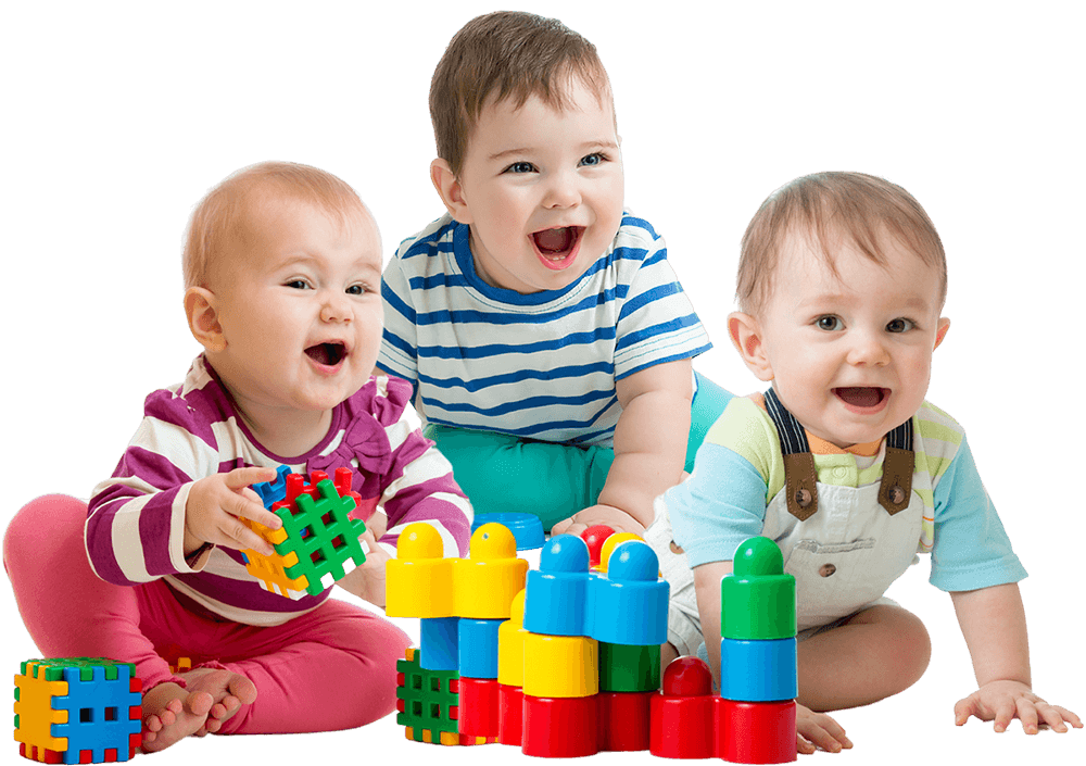 Three toddlers with bold smiles display sheer delight as they play with interlocking toys and blocks featuring primary colors.